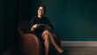 © Jacob Lund - Happy female enjoying coffee while sitting on armchair