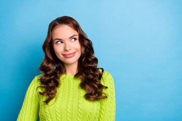 Sticker - Photo of cute young girl wavy hairdo interesting sales poster wear trendy fall green knitwear sweater isolated on blue color background