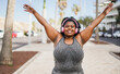 Leinwandbild Motiv Happy curvy african woman celebrating during workout routine outdoor - Focus on face
