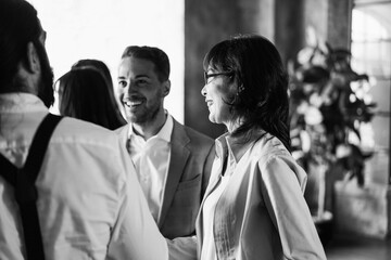 Wall Mural - Multiracial business people working inside office - Soft focus on senior woman glasses - Black and white editing