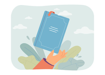 Wall Mural - hand holding closed book or diary with bookmark. bookshop or library, person with textbook or notebo