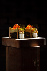 Sticker - Unwrapped roll with nori, rice, salmon, tobiko caviar