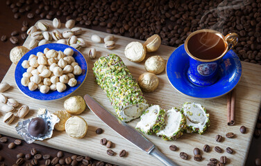 Wall Mural - Sweets on the background of coffee on the table