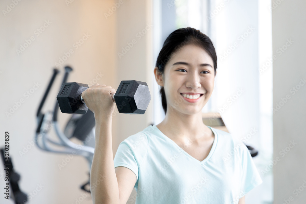 Beautiful And Shapely Asian Woman Working Out In The Gym Play Exercise beautiful-and-shapely-asian-woman-working-out-in-the-gym-play-exercise