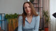© Andrii Iemelianenko - POV of young business woman sitting at table working from home office looking at camera, making video webcam conference call with client or boss, enjoying pleasant conversation. Girl remote job online