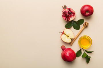 Flat lay composition with symbols jewish Rosh Hashanah holiday attributes on colored background, Rosh hashanah concept. New Year holiday Traditional. Top view with copy space