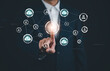 © Bussarin - Businessman touch button Circular futuristic interface of smart home automation assistant on a virtual screen and a user touching a home button, digital big data and virtual technology,