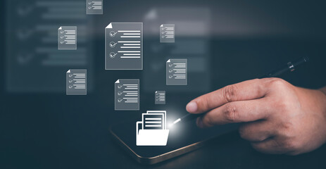 Hand using laptop and touch folder of document Management System, online documentation database and process automation to efficiently manage files work, knowledge, Corporate business technology,