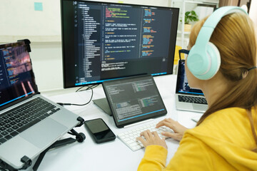 Programmer is coding and programming software.