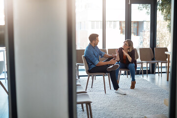Fototapete - Talking, planning or meeting team of colleagues brainstorming ideas, discussing strategy and sharing plans in office. Confident and serious business woman discussing and explaining to male coworker