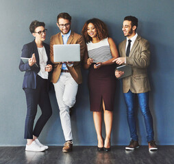 Aufkleber - Group or team of business people working and browsing with wireless technology in studio against a grey background. Digital marketing colleagues networking online to advertise a startup company