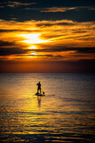 Fototapeta  - silhouette of a person with a surfboard