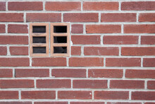 A Wall With Red Small Bricks With An Extractor Hood In The Wall, A Background For A Screensaver With A Place For An Inscription