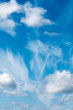 beautiful clouds with blue sky with small birds in the frame