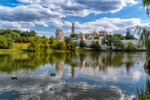 View Of The Novodevichy Monastery From The Side Of The Pond With Reflection.