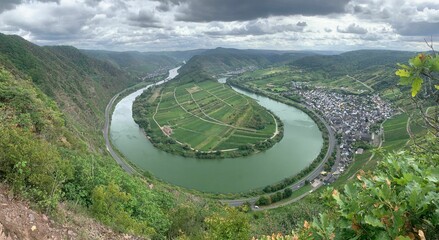 Sticker - View of beautiful Mosel river surrounded with greenery and city of Bernkastel-Kues in Germany