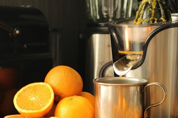 Sticker - Process of making fresh orange juice with a juicer.