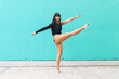 © ADDICTIVE STOCK - Barefoot Asian ballerina dancing on street