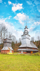 Wall Mural - Very old wooden church in Carpathian mountaines.