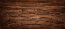 Walnut Tree Texture Close Up. Wide Walnut Wood Texture Background. Walnut Veneer Is Used In Luxury Finishes.