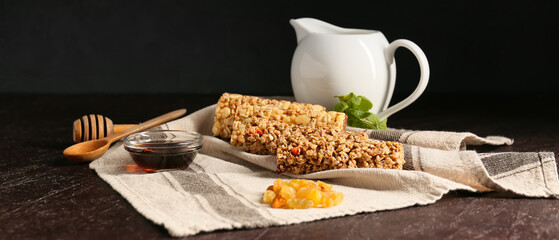 Healthy cereal bars on dark background