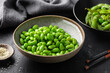 edamame beans in ceramic bowl, soybeans, selective focus