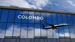 Airplane landing at Colombo Sri Lanka airport mirrored in terminal
