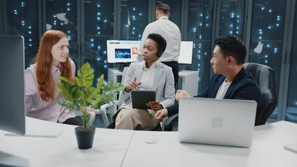 Wall Mural - close up meeting in data center. multi-ethnic experienced staff of it workers communicating about bu