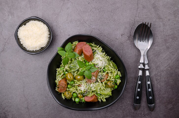 Wall Mural - Pasta with vegetables and sausages