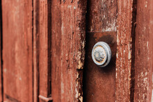 Vintage Round Door Iron Handle Or Knob With A Symbol On It Of A Wooden Door