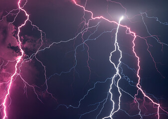 Fork lightning striking down during summer storm	