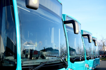 city shuttle buses rank at Frankfurt bus station in Germany, green vehicle public transport concept, transport companies strike, transport facilities for people in all localities