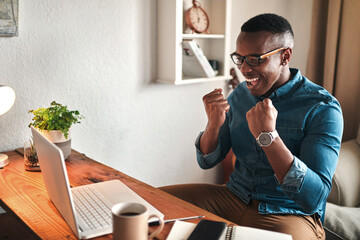 Aufkleber - Excited male on a home computer feeling happy, confident and proud about winning an online casino web game. Smiling man enjoying a digital win indoors. Guy celebrating success and having fun inside