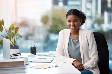 young, confident and ambitious business woman and corporate professional looking happy, positive and