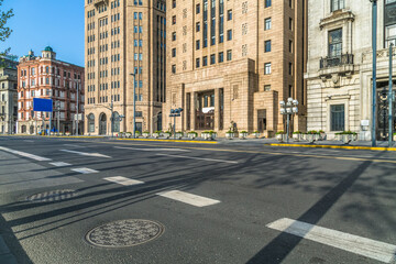 Wall Mural - clean urban road with modern building in the city