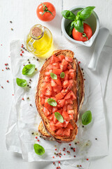 Wall Mural - Homemade and aromatic bruschetta as traditional starter.