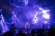 Leinwandbild Motiv Dj playing techno music on the live night concert in summer