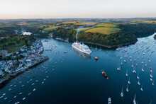 Aerial View Of Cruise Ship Leaving Fowey Harbour, Cornwall, United Kingdom.