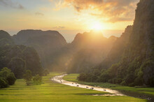 River Through Rice Fields In Mountain Valley, Ninh Binh, Vietnam