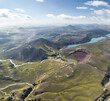 © AmazingAerialAgency - Aerial view of a beautiful landscape with volcano craters and high mountains near Holmsarfossar, iceland.