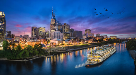Wall Mural - nashville skyline with river and sunset