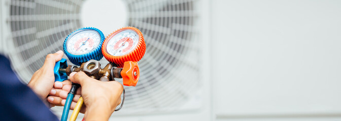 Wall Mural - Air Conditioning Technician and A part of preparing to install new air conditioner.