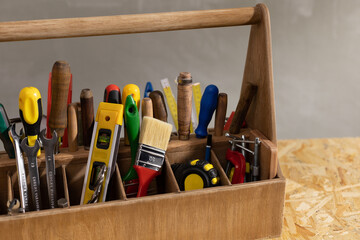 Canvas Print - Construction tools and toolbox at wooden table background. Tools kit and tool box