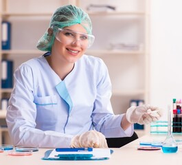 young female chemist working in the lab