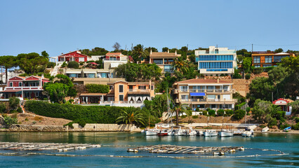 Wall Mural - Architecture of houses on the coast of the port of Mahon (Mao) in Menorca, Spain