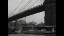 Brooklyn Bridge 1931 - Viewing The Brooklyn Bridge From A Ferry That Passes Beneath It In New York, New York, 1931. 