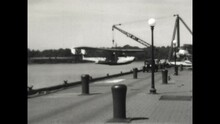 Float Plane Launch 1931 - A Consolidated P2Y Float Plane, Belonging To The US Navy, Is Lowered To The Water By Crane At The US Naval Academy In Annapolis, Maryland In 1931. 