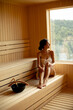 © BGStock72 - Young woman relaxing in the sauna