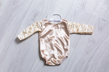 Wall Mural - baby clothes for newborns. bodysuit with lace skirt