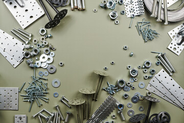 Wall Mural - Set of bolts nuts nails metal fasteners. Consumable hardware tools. assortment steel screws collection close up background